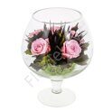 Preserved roses in a glass vase