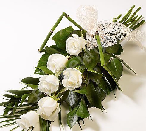 Funeral bouquet of white roses