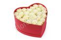 White preserved roses in heart shaped box