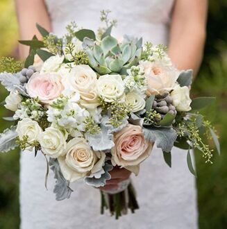 Bridal bouquet with roses and succulents