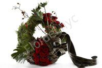 Funeral arrangement with black ribbon