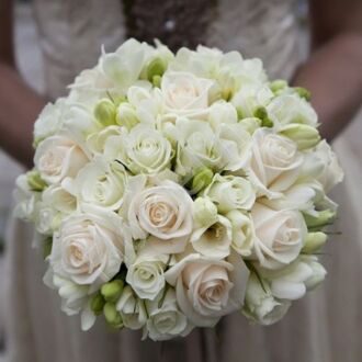 White bridal bouquet with roses and freesia